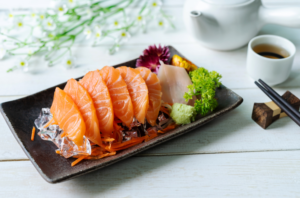 Salmon sashimi with hot sake.png